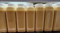 Fridge fully stocked with custom eggnog bottles